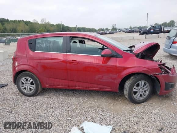 2015 Chevrolet Sonic LT with VIN 1G1JC6SH9F4113781, listed as a IAAI auction lot 43111610 with 70,632 mi miles and . Bid and sale history available at DreamBid. Image 13.
