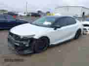 2023 Toyota Camry TRD with VIN 4T1KZ1AKXPU082161, listed as a IAAI auction lot 43388188 with 42,868 mi miles and . Bid and sale history available at DreamBid. Image 2.