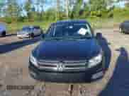 2013 Volkswagen Tiguan S with VIN WVGAV3AX5DW559819, listed as a IAAI auction lot 43436570 with 113,423 mi miles and . Bid and sale history available at DreamBid. Image 6.