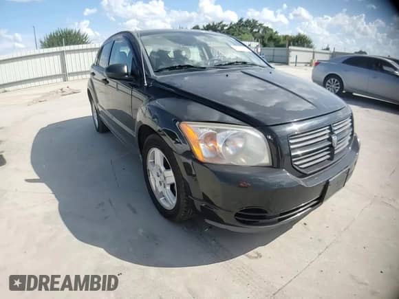 2008 Dodge Caliber SE z VIN 1B3HB28B88D701583, wystawiony jako Copart lot #62349225 z przebiegiem 173 377 mil mil oraz Szkoda całkowita • Salvage title. Historia ofert i sprzedaży dostępna na DreamBid. Obrazek 14.