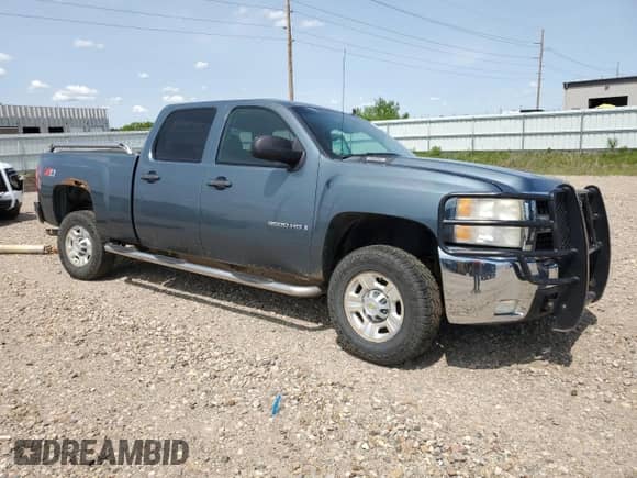 2009 Chevrolet Silverado 2500HD LT с VIN 1GCHK53K99F120607, выставлен на аукционе Copart как лот 58598345 с пробегом 166 036 миль миль и Списание • Salvage title. История ставок и продаж доступна на DreamBid. Изображение 4.