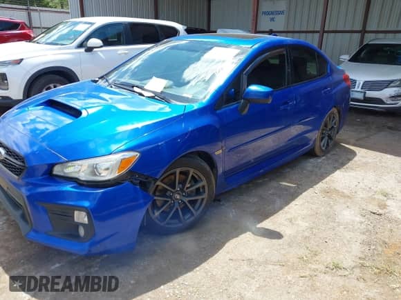 2018 Subaru WRX Premium with VIN JF1VA1C65J9802670, listed as a IAAI auction lot 42213764 with 119,400 mi miles and . Bid and sale history available at DreamBid. Image 2.