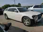 2007 Dodge Magnum with VIN 2D4FV47V77H776624, listed as a Copart auction lot 70665334 with 211,212 mi miles and Salvage title. Bid and sale history available at DreamBid. Image 4.