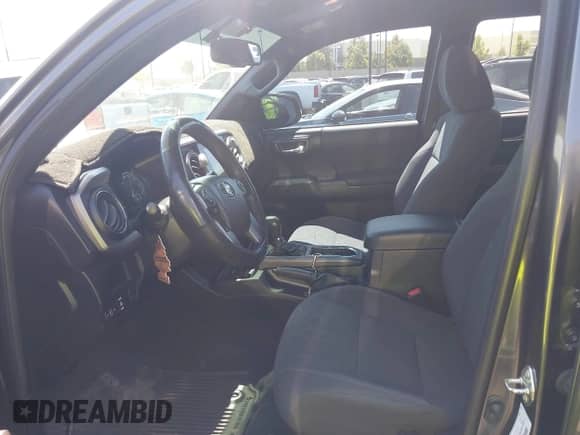 2016 Toyota Tacoma SR5 with VIN 3TMAZ5CNXGM009360, listed as a IAAI auction lot 43186084 with 89,490 mi miles and . Bid and sale history available at DreamBid. Image 5.