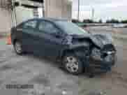 2015 Chevrolet Sonic LS with VIN 1G1JB5SG0F4210338, listed as a Copart auction lot 63960604 with 210,499 mi miles and Salvage title. Bid and sale history available at DreamBid. Image 4.