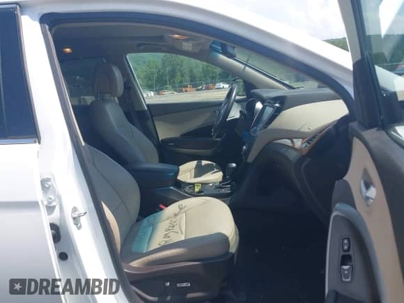 2014 Hyundai Santa Fe with VIN 5XYZWDLA1EG225384, listed as a IAAI auction lot 42518990 with 99,125 mi miles and . Bid and sale history available at DreamBid. Image 5.