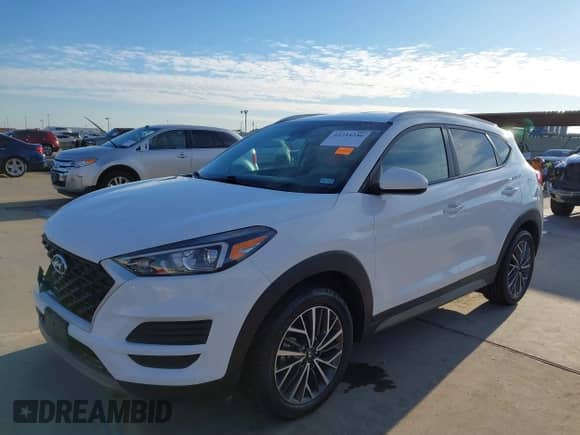 2020 Hyundai Tucson Sport with VIN KM8J33AL8LU251329, listed as a IAAI auction lot 41254246 with 61,626 mi miles and . Bid and sale history available at DreamBid. Image 2.
