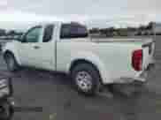 2014 Nissan Frontier S with VIN 1N6BD0CT9EN710220, listed as a Copart auction lot 64724955 with 133,169 mi miles and Salvage title. Bid and sale history available at DreamBid. Image 2.