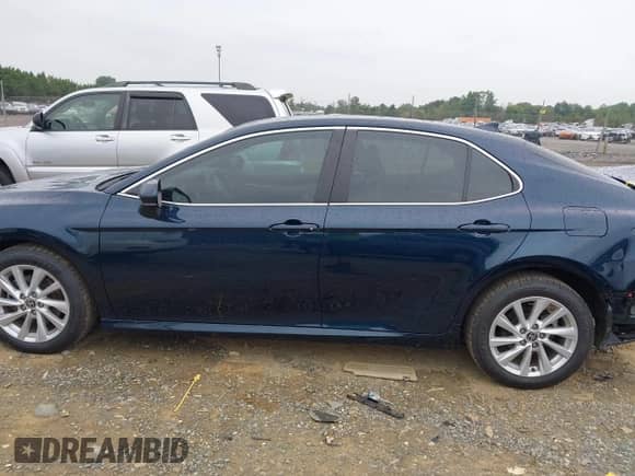 2021 Toyota Camry LE with VIN 4T1C11AK8MU548158, listed as a IAAI auction lot 43333222 with 34,824 mi miles and . Bid and sale history available at DreamBid. Image 15.