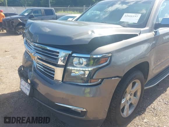 2017 Chevrolet Suburban Premier with VIN 1GNSCJKC5HR309457, listed as a IAAI auction lot 42666197 with 99,932 mi miles and . Bid and sale history available at DreamBid. Image 18.
