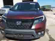 2020 Honda Passport EX-L with VIN 5FNYF7H51LB004722, listed as a Copart auction lot 87407905 with 28,860 mi miles and Salvage title. Bid and sale history available at DreamBid. Image 14.