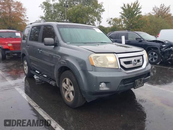2010 Honda Pilot EX with VIN 5FNYF4H49AB018743, listed as a IAAI auction lot 43427399 with 273,003 mi miles and . Bid and sale history available at DreamBid. Image 1.