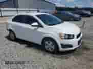 2014 Chevrolet Sonic LS with VIN 1G1JA5SH1E4171656, listed as a Copart auction lot 70268635 with 77,692 mi miles and Salvage title. Bid and sale history available at DreamBid. Image 4.