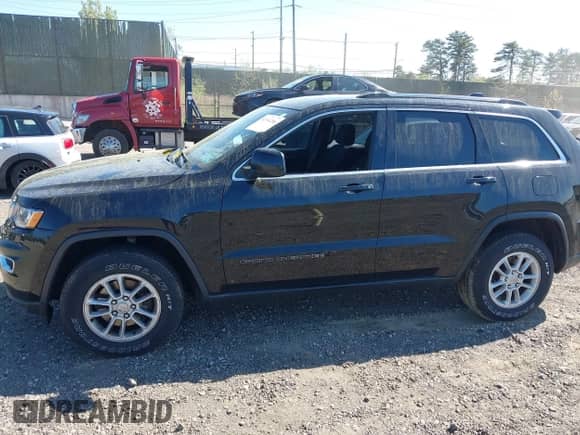 2019 Jeep Grand Cherokee Altitude with VIN 1C4RJFAG7KC834321, listed as a IAAI auction lot 42144206 with 97,015 mi miles and . Bid and sale history available at DreamBid. Image 14.