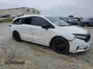 2024 Honda Odyssey Sport z VIN 5FNRL6H72RB067314, wystawiony jako Copart lot #54873405 z przebiegiem 20 805 mil mil oraz Szkoda całkowita • Salvage title. Historia ofert i sprzedaży dostępna na DreamBid. Obrazek 4.
