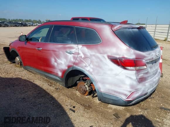 2017 Hyundai Santa Fe Limited Ultimate z VIN KM8SR4HF5HU167064, wystawiony jako IAAI lot #43351861 z przebiegiem 142 714 mil mil oraz . Historia ofert i sprzedaży dostępna na DreamBid. Obrazek 3.