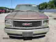 1998 GMC Sierra 1500 z VIN 1GTEC14W2WZ550452, wystawiony jako Copart lot #62010275 z przebiegiem 214 269 mil mil oraz Czysty tytuł • Clean title. Historia ofert i sprzedaży dostępna na DreamBid. Obrazek 5.