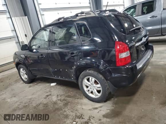 2008 Hyundai Tucson with VIN KM8JN12B18U912677, listed as a Copart auction lot 86210754 with 189,560 mi miles and Salvage title. Bid and sale history available at DreamBid. Image 2.