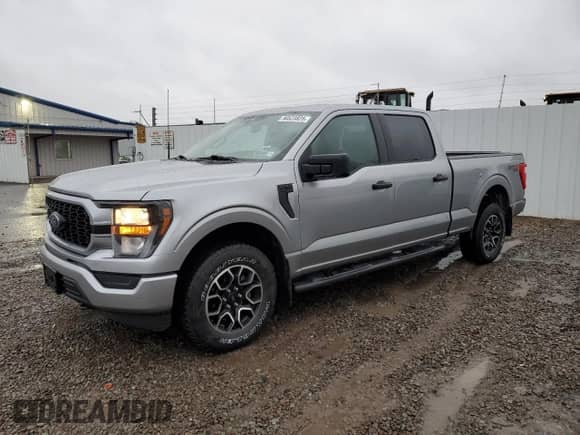 2023 Ford F-150 XL с VIN 1FTFW1E59PKD39339, выставлен на аукционе Copart как лот 90523825 с пробегом 83 174 миль миль и Списание • Salvage title. История ставок и продаж доступна на DreamBid. Изображение 1.