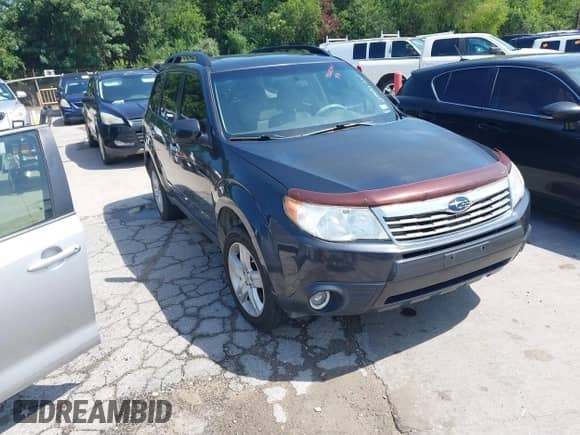 2009 Subaru Forester X Limited z VIN JF2SH64609H717825, wystawiony jako IAAI lot #42687851 z przebiegiem 219 163 mil mil oraz . Historia ofert i sprzedaży dostępna na DreamBid. Obrazek 1.