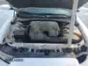 2013 Dodge Charger SE z VIN 2C3CDXBG8DH734850, wystawiony jako Copart lot #84279015 z przebiegiem 239 305 mil mil oraz Czysty tytuł • Clean title. Historia ofert i sprzedaży dostępna na DreamBid. Obrazek 11.