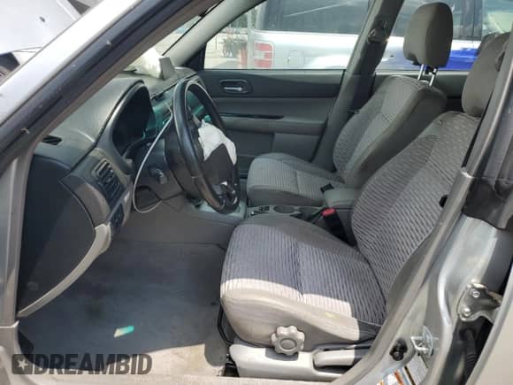 2004 Subaru Forester XS with VIN JF1SG65654H737678, listed as a Copart auction lot 67082055 with 211,766 mi miles and Salvage title. Bid and sale history available at DreamBid. Image 7.