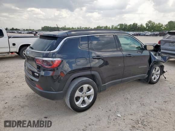 2021 Jeep Compass Latitude with VIN 3C4NJDBBXMT584022, listed as a Copart auction lot 69013615 with 74,898 mi miles and Salvage title. Bid and sale history available at DreamBid. Image 3.