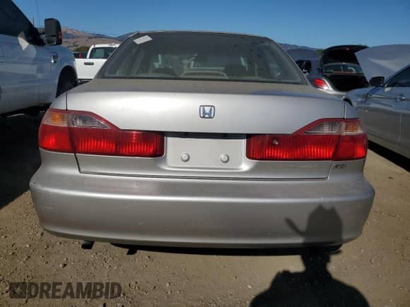 1999 Honda Accord EX with VIN 1HGCG1654XA010134, listed as a Copart auction lot 67599455 with 263,752 mi miles and Salvage title. Bid and sale history available at DreamBid. Image 6.