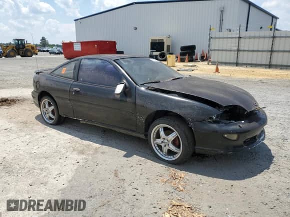 1998 Chevrolet Cavalier with VIN 1G1JF12TXW7102446, listed as a Copart auction lot 58949874 with 70,650 mi miles and Clean title. Bid and sale history available at DreamBid. Image 4.