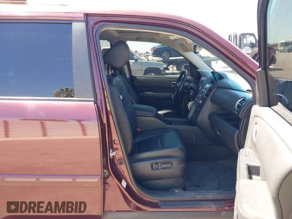 2014 Honda Pilot EX-L with VIN 5FNYF3H5XEB009008, listed as a IAAI auction lot 43024881 with 119,646 mi miles and . Bid and sale history available at DreamBid. Image 5.