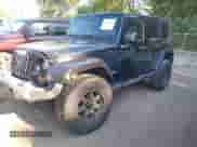 2007 Jeep Wrangler Unlimited Sahara z VIN 1J8GA59167L207644, wystawiony jako IAAI lot #43143110 z przebiegiem 92 971 mil mil oraz . Historia ofert i sprzedaży dostępna na DreamBid. Obrazek 17.