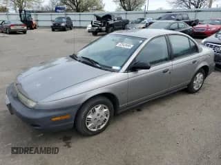 1999 Saturn SL с VIN 1G8ZH5286XZ266266, выставлен на аукционе Copart как лот 52543495 с пробегом 220 622 миль миль и Списание • Salvage title. История ставок и продаж доступна на DreamBid. Изображение 1.
