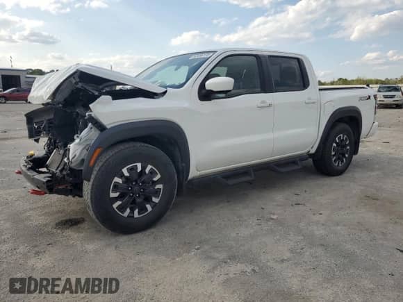 2023 Nissan Frontier Pro-X with VIN 1N6ED1EJ6PN661933, listed as a Copart auction lot 52496135 with 28,533 mi miles and Salvage title. Bid and sale history available at DreamBid. Image 1.