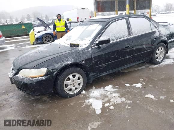 2002 Honda Accord EX with VIN 1HGCG55682A103846, listed as a IAAI auction lot 41512374 with 312,884 mi miles and . Bid and sale history available at DreamBid. Image 2.