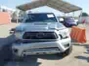 2014 Toyota Tacoma PreRunner with VIN 3TMKU4HN4EM040073, listed as a IAAI auction lot 42921466 with 156,910 mi miles and . Bid and sale history available at DreamBid. Image 13.