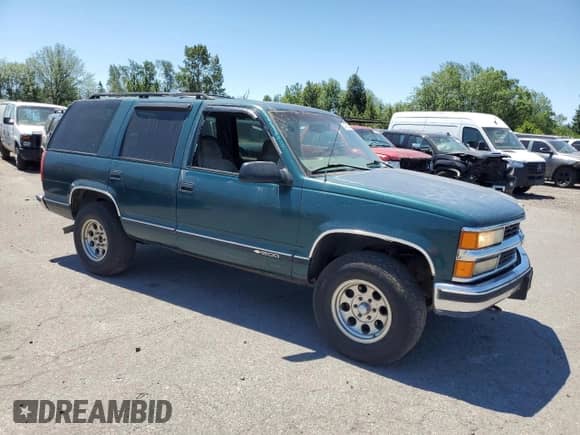 1997 Chevrolet Tahoe с VIN 1GNEK13R6VJ340522, выставлен на аукционе Copart как лот 62493055 с пробегом 266 579 миль миль и Списание • Salvage title. История ставок и продаж доступна на DreamBid. Изображение 4.