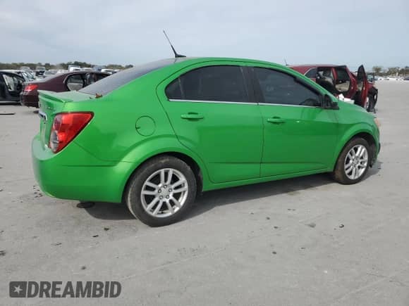 2014 Chevrolet Sonic LT z VIN 1G1JC5SH1E4235981, wystawiony jako Copart lot #86264865 z przebiegiem Nie podano mil oraz Czysty tytuł • Clean title. Historia ofert i sprzedaży dostępna na DreamBid. Obrazek 3.