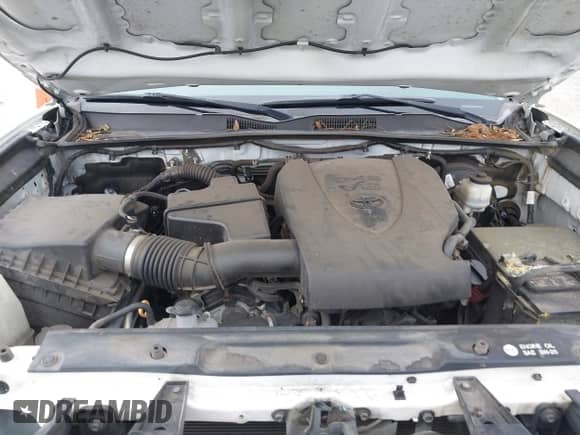 2018 Toyota Tacoma SR5 z VIN 3TMBZ5DN4JM014788, wystawiony jako IAAI lot #41252667 z przebiegiem 113 530 mil mil oraz . Historia ofert i sprzedaży dostępna na DreamBid. Obrazek 10.
