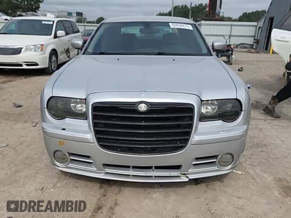 2007 Chrysler 300 C SRT-8 with VIN 2C3LA73W17H617839, listed as a Copart auction lot 60858475 with 180,655 mi miles and Salvage title. Bid and sale history available at DreamBid. Image 13.