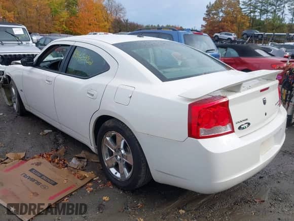 2009 Dodge Charger SXT with VIN 2B3KA33V39H573063, listed as a IAAI auction lot 43465982 with 92,296 mi miles and . Bid and sale history available at DreamBid. Image 3.