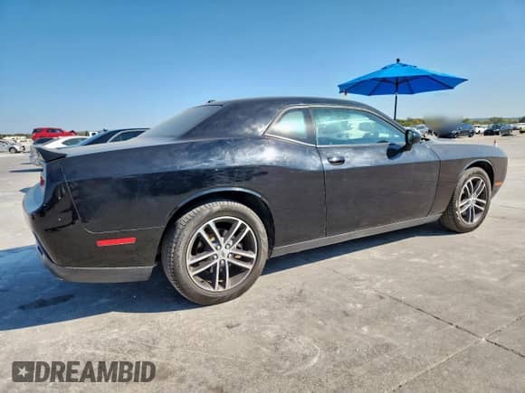 2019 Dodge Challenger SXT with VIN 2C3CDZGG7KH712968, listed as a Copart auction lot 85871395 with 69,592 mi miles and Clean title. Bid and sale history available at DreamBid. Image 3.