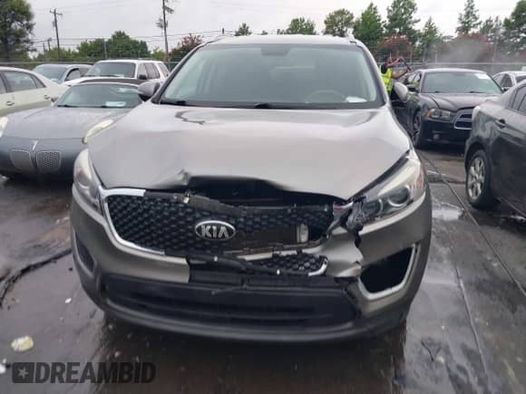 2017 Kia Sorento LX z VIN 5XYPG4A34HG298309, wystawiony jako IAAI lot #43013503 z przebiegiem 150 581 mil mil oraz . Historia ofert i sprzedaży dostępna na DreamBid. Obrazek 12.