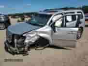 2009 Honda Pilot Touring with VIN 5FNYF38809B002505, listed as a Copart auction lot 61857065 with Not provided miles and Salvage title. Bid and sale history available at DreamBid. Image 1.