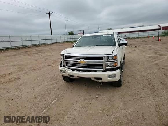 2015 Chevrolet Silverado 1500 High Country с VIN 3GCUKTEJ1FG191463, выставлен на аукционе Copart как лот 57151865 с пробегом 124 420 миль миль и Списание • Salvage title. История ставок и продаж доступна на DreamBid. Изображение 14.