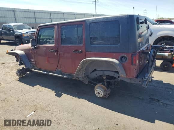 2007 Jeep Wrangler Unlimited Sahara z VIN 1J4GA59157L122909, wystawiony jako Copart lot #67484885 z przebiegiem Nie podano mil oraz Szkoda całkowita • Salvage title. Historia ofert i sprzedaży dostępna na DreamBid. Obrazek 2.