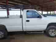 2005 Chevrolet Silverado 2500HD Work Truck with VIN 1GCHC24U05E275672, listed as a IAAI auction lot 42243540 with 179,665 mi miles and . Bid and sale history available at DreamBid. Image 14.