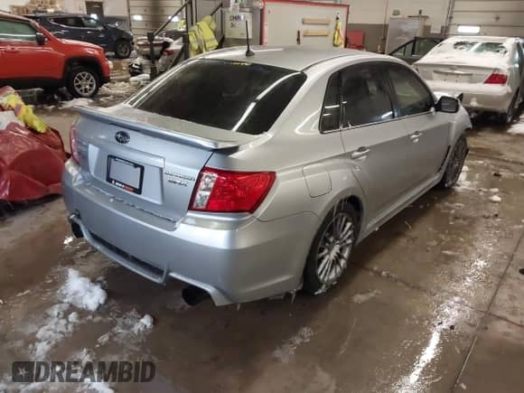 2012 Subaru WRX WRX with VIN JF1GV7E65CG023040, listed as a IAAI auction lot 41622053 with 110,718 mi miles and . Bid and sale history available at DreamBid. Image 4.