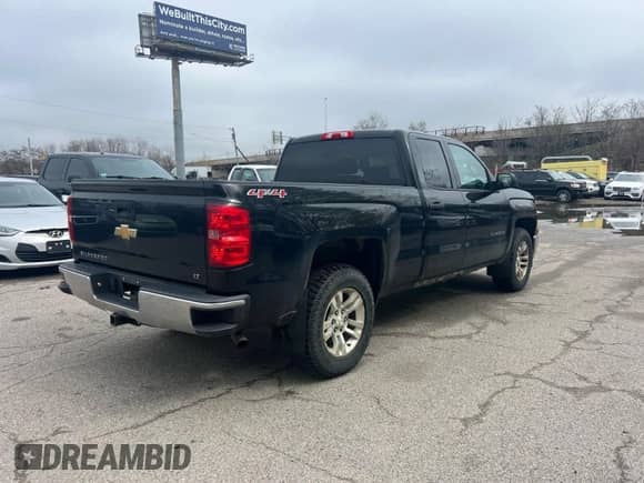 2014 Chevrolet Silverado 1500 LT z VIN 1GCVKREH1EZ169899, wystawiony jako IAAI lot #42143501 z przebiegiem 124 789 mil mil oraz . Historia ofert i sprzedaży dostępna na DreamBid. Obrazek 4.