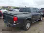 2023 Toyota Tacoma SR with VIN 3TMCZ5ANXPM538495, listed as a IAAI auction lot 42993850 with 41,728 mi miles and . Bid and sale history available at DreamBid. Image 4.