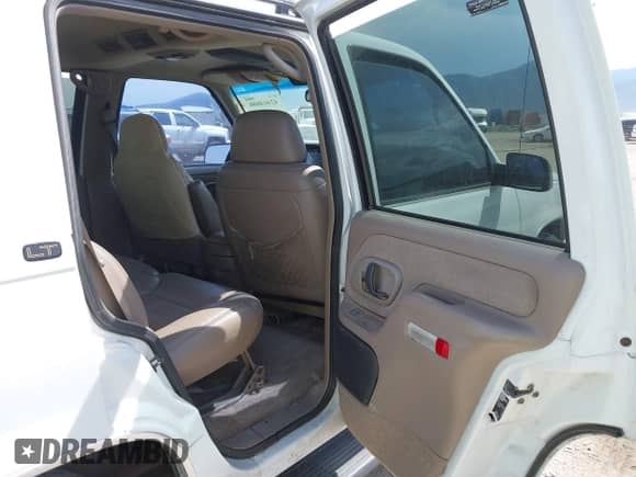 1999 Chevrolet Tahoe with VIN 1GNEC13RXXJ351815, listed as a IAAI auction lot 42464686 with 153,625 mi miles and . Bid and sale history available at DreamBid. Image 8.